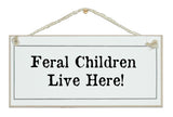 Feral husband/wife/children live here. Sign