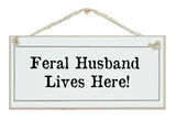 Feral husband/wife/children live here. Sign