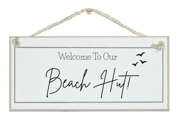 Welcome to our beach hut sign