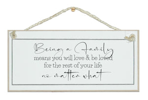 Being a family, you are loved. 2023 sign