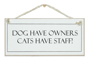 Dogs owners, cats staff...sign
