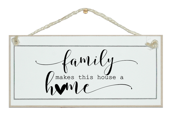 Family makes  this house a home. Sign.