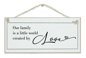 Family a little world created by love. 2023 sign