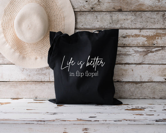 Life is better in flip flops black tote bag
