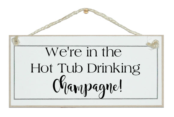 In Hot Tub drinking Champagne!