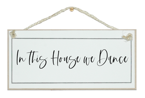 In this house we dance. Sign