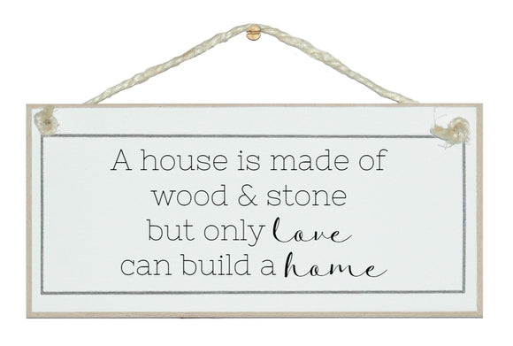 House, wood and stone, love a home. Sign.