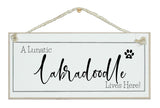 A.....dog breed, lives here signs