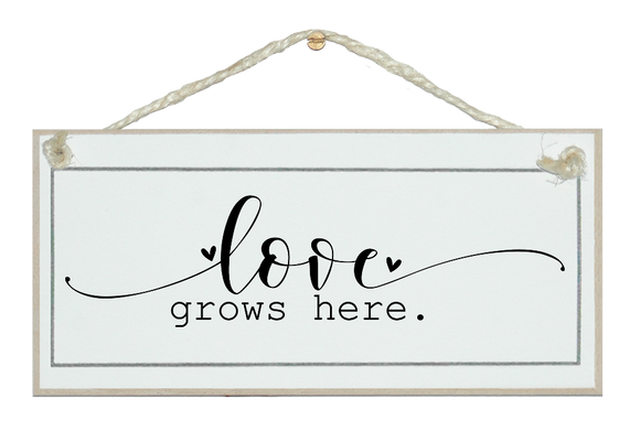 Love grows here. Sign.