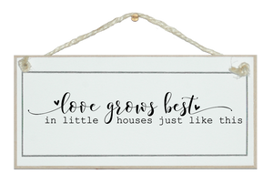 Love grows in little houses. Sign.