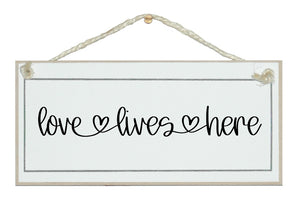 Love lives here...farmhouse style sign