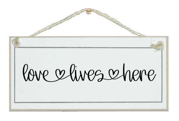 Love lives here...farmhouse style sign