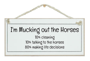 Mucking out horses...