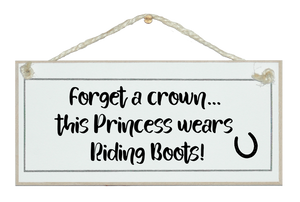 This princess wears riding boots. sign